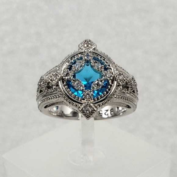 Sterling Silver Caged Blue Ring